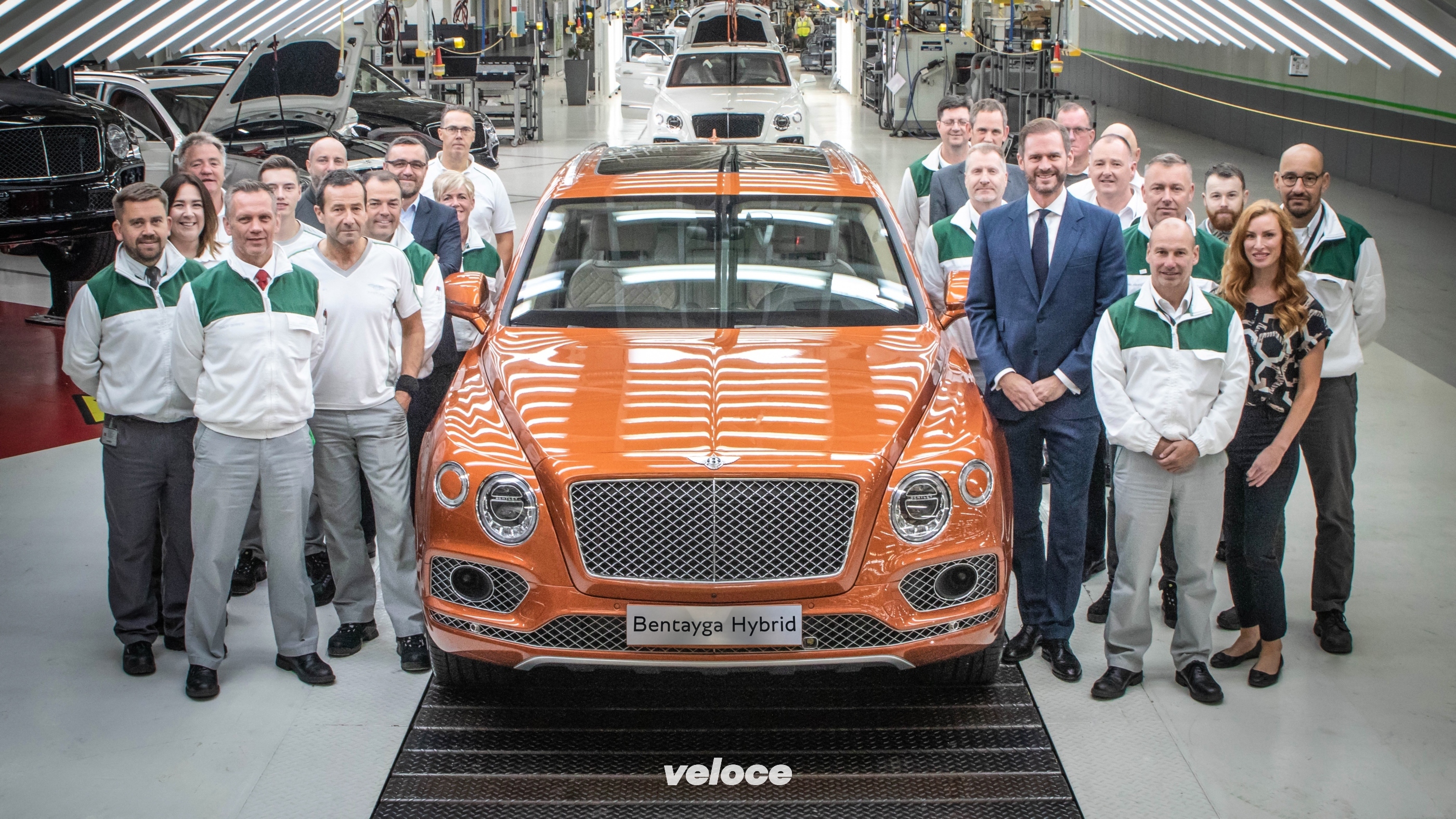 Production colleagues alongside the first Bentayga Hybrid - 5