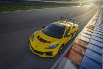 Front aerial shot of the Chevrolet Corvette ZR1 coupe in Competition Yellow with optional ZTK Performance Package on the race track. Preproduction model shown. Actual production model may vary. Front aerial shot of the Chevrolet Corvette ZR1 coupe in Competition Yellow with optional ZTK Performance Package on the race track. Preproduction model shown. Actual production model may vary.