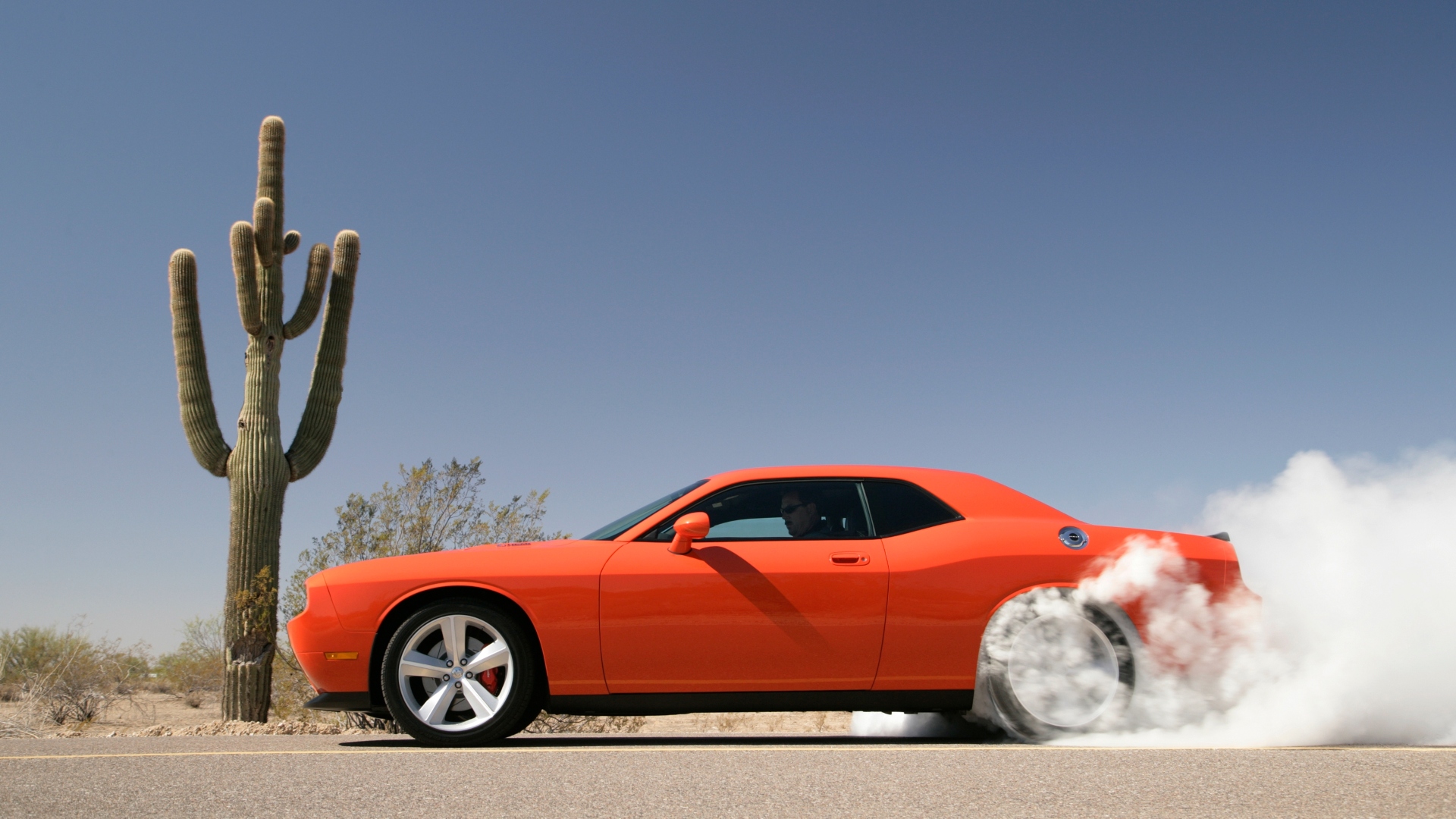 Profile, driver's side, tires smoking, 2008 Dodge Challenger SRT8