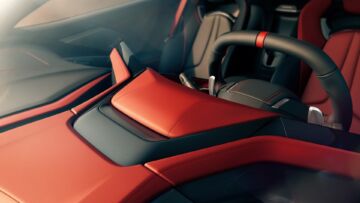Asymmetrical Adrenaline Red interior on 2026 Chevrolet Corvette Stingray. Preproduction model shown, actual production model may vary.
